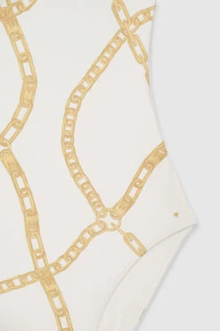 Anine Bing | Jace One Piece - Cream -Fashion Clothing Store AB JACE ONE PIECE CREAM AND TAN LINK PRINTA 11 0107 122 2 1700x 9f2eed51 49f8 41ba 83a3 ba7e74f26f77