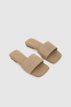 Anine Bing | Ria Slides - Butterscotch Monogram -Fashion Clothing Store AB RIA SLIDES BUTTERSCOTCH MONOGRAMA 14 9100 270 2 1700x 97478bd5 3df9 4b20 b626 cf1e65984be5
