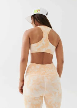 P.E Nation | React Sports Bra - Golden Sand -Fashion Clothing Store PENATION Q2 APR22 MAY22 TASH GALGUT S07 052 800x f3fa40a9 1fe8 40f9 9ccc e1a63cf27232
